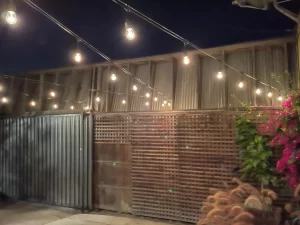 Evening outdoor lighting by top Sacramento electrical services showcasing a radiant patio