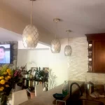 Your Trusted Bay Area Electricians 36 A satisfied Nelsy R. admiring the swift and satisfactory lighting work by VicRad Home Services.